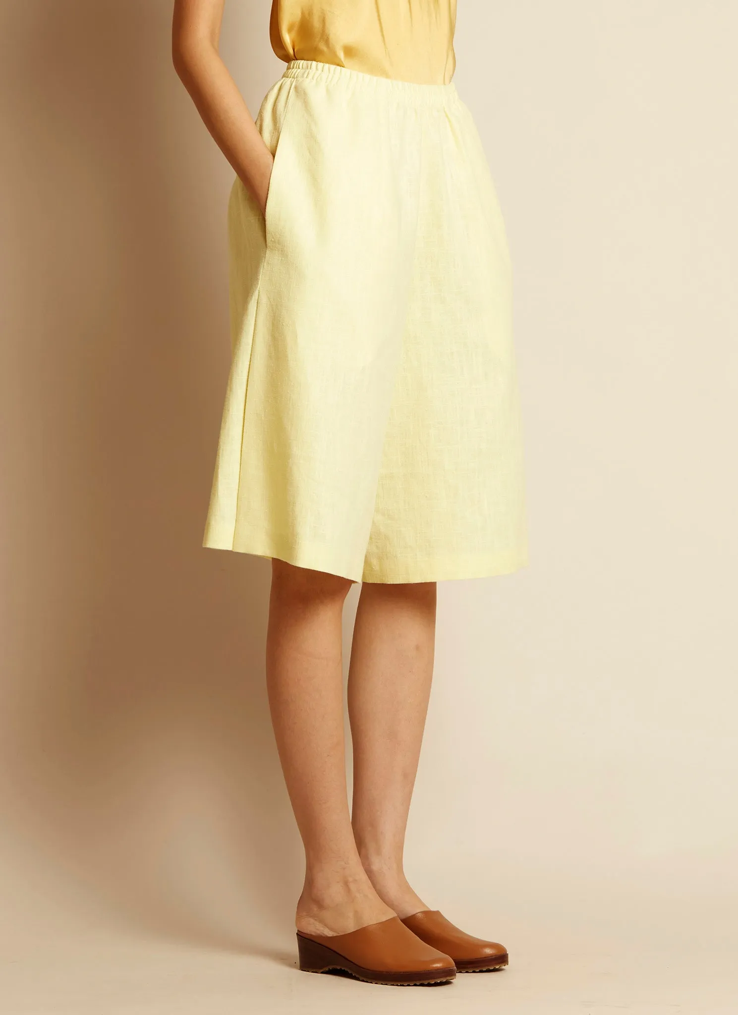 Sand Pleated Knee-High Shorts w/ Elastic in Light Yellow